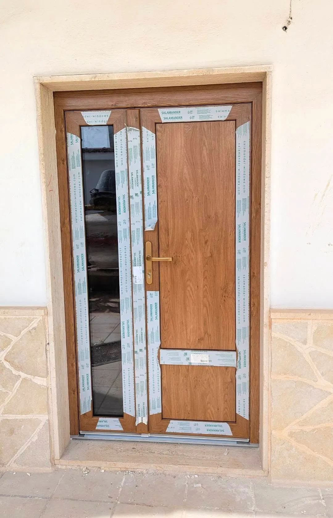 Portoncino d'ingresso in PVC effetto legno chiaro